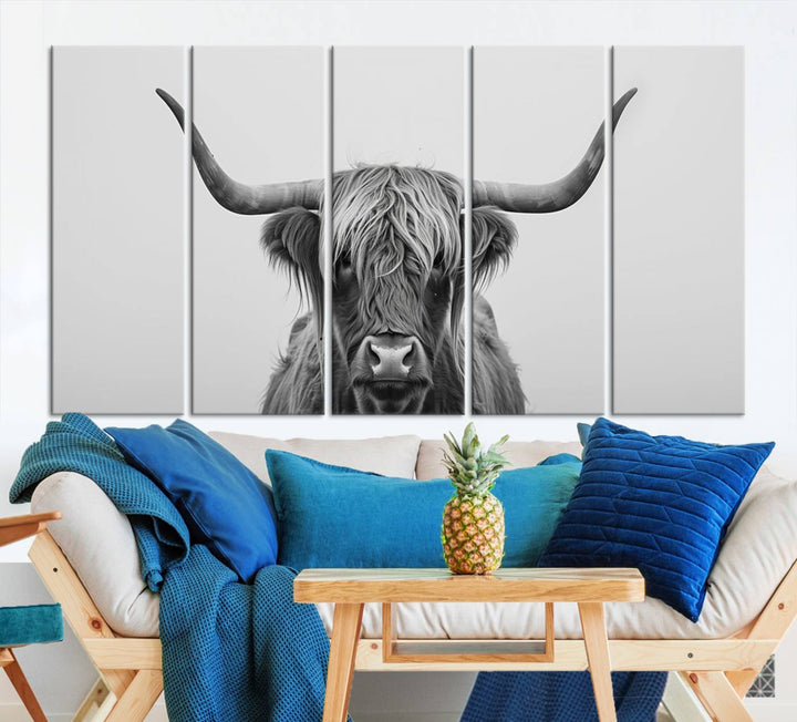 A triptych titled "Farmhouse Longhorn Wall Art Canvas Print, Longhorn Texas Wall Art Canvas Print," rendered in a gallery-quality finish, hangs prominently on the wall.