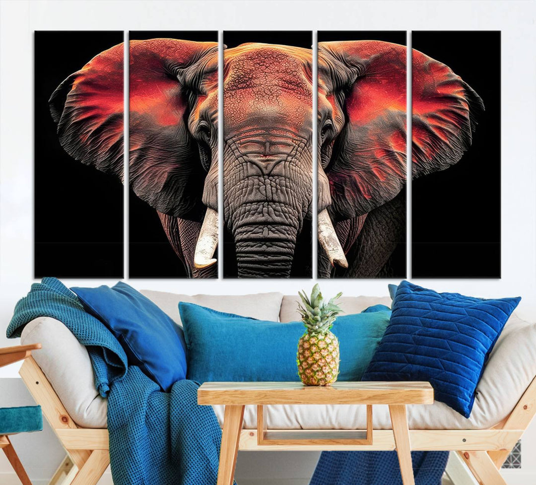 The Elephant Wall Art Canvas Print, featuring vibrant red and black tones, is a stunning artwork printed on museum-quality canvas. It comes with a UV-protective coating.