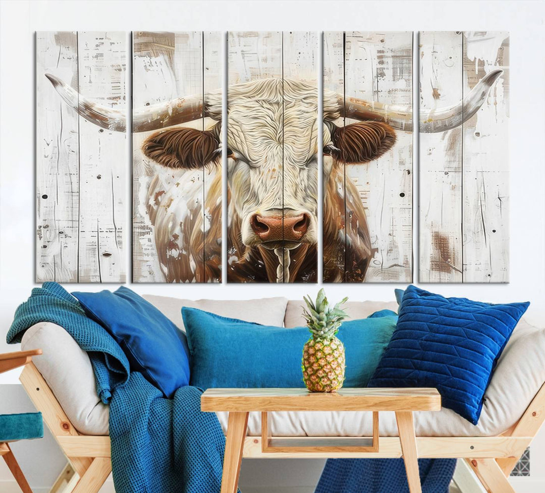 The dimly lit room is enhanced with Western charm by the Rustic Longhorn Bull Wall Art Canvas Set—Western-Inspired Farmhouse Décor, elegantly displayed on the wall.