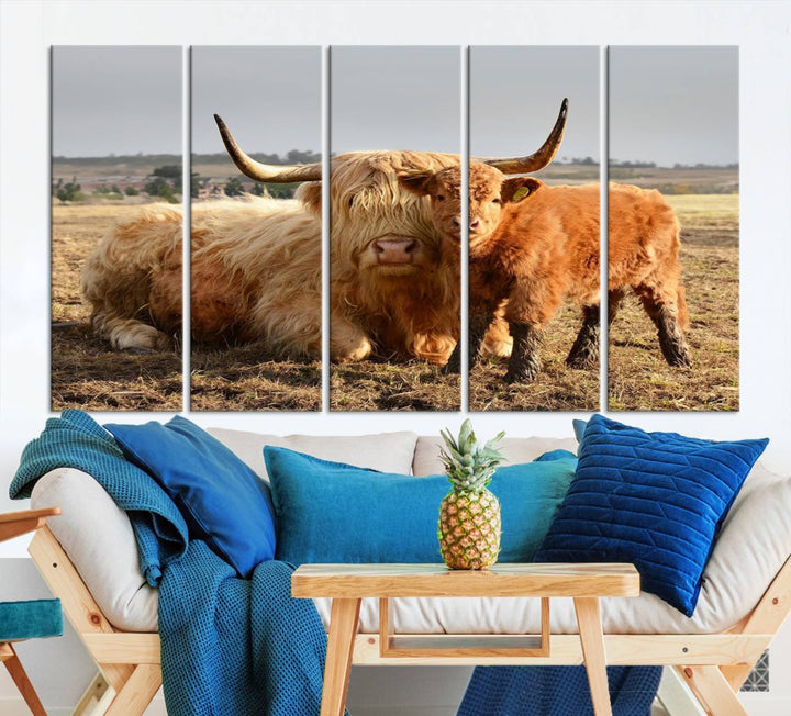 The three-panel canvas artwork, titled "Highland Cow Canvas Wall Art Animal Print for Farm House Decor," features a serene scene of a resting Highland cow and calf in a field. The piece highlights its gallery-quality finish.