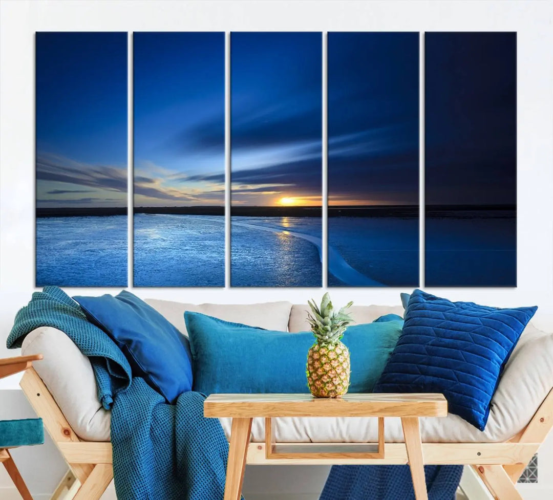 The living room features a triptych of the Wall Art Canvas Print Navy Sunset Lake Landscape Artwork, adding to its tranquil vibe.