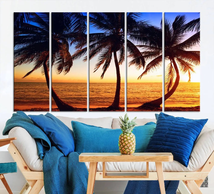 The living room features a wall adorned with the "Wall Art Canvas Curve Palms at Sunset on Beach," showcasing gallery-wrapped, museum-quality canvases in a stunning triptych.