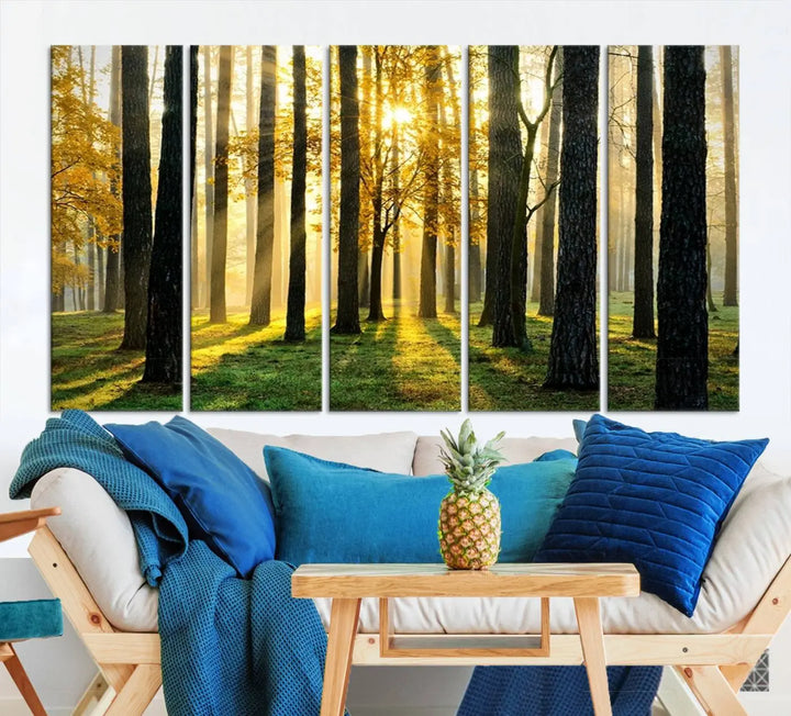 The living room is enhanced by the "Wall Art Landscape Canvas Print Tall Trees in Forest at Sunset" on museum-quality canvas. This triptych, complete with a UV-protective coating, is ready to hang and adds an artistic touch to the space.