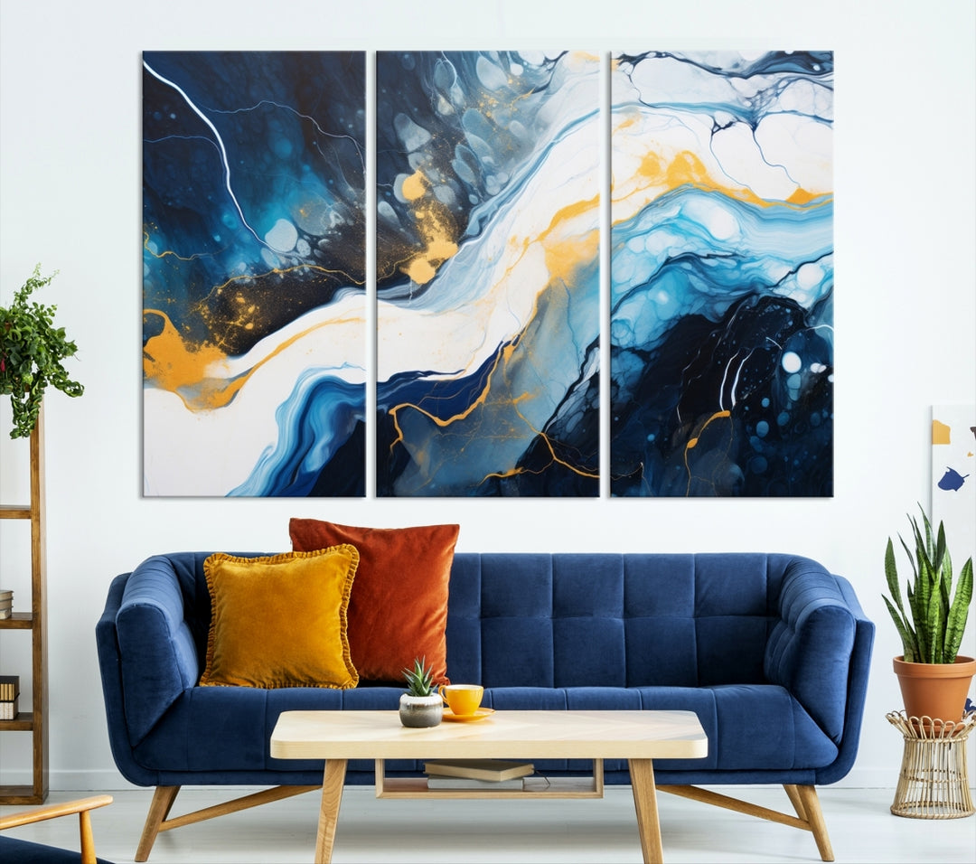 The Navy Blue Abstract Wall Art Canvas Print, displaying an exquisite array of blue, white, and gold swirls, is crafted on museum-quality canvas and enhances the space with its sophisticated elegance.