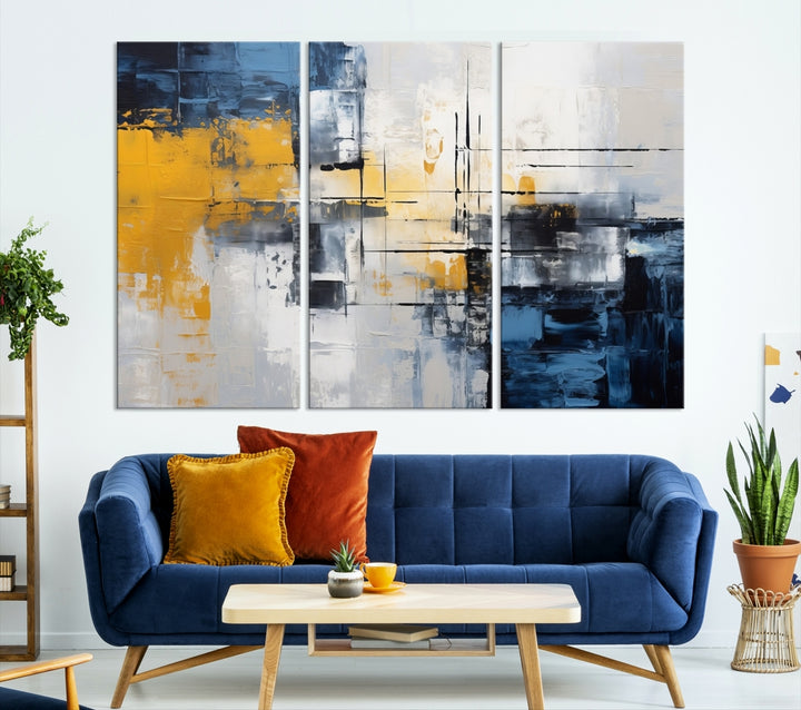 The Yellow Orange Blue Abstract Wall Art Print on gallery-wrapped, museum-quality canvases adds a vibrant touch to the room.