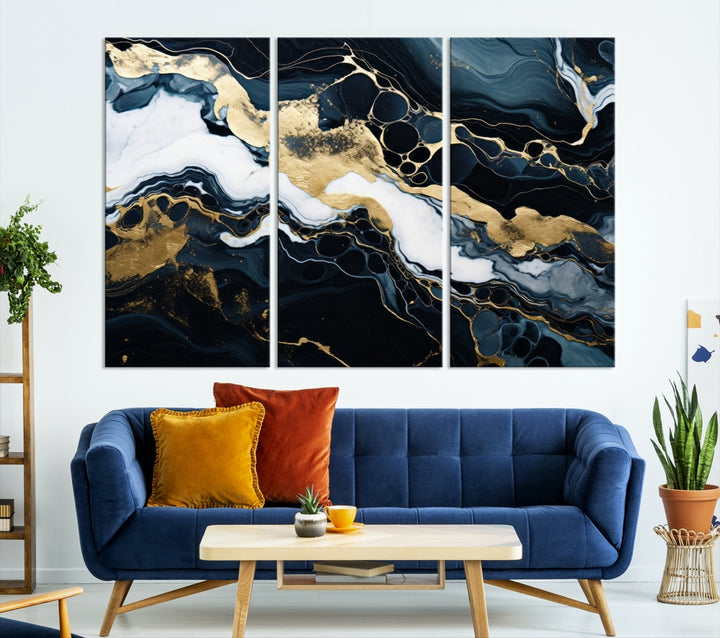 Fluid Marble Abstract Wall Art Print, a contemporary piece with black, white, and gold swirls on museum-quality canvas.