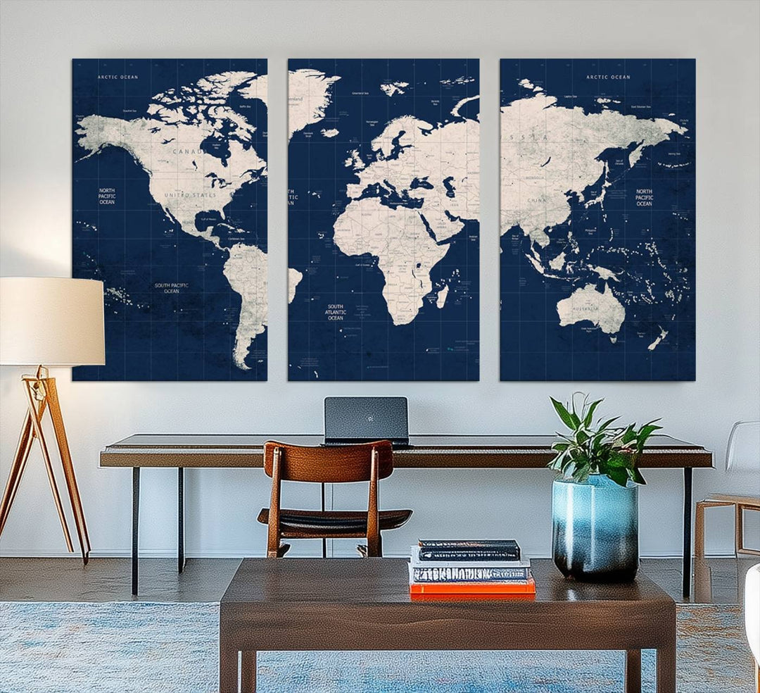 Large modern world map wall art canvas print in beige and navy; showcases a 3-panel vintage map design and is ready to hang.