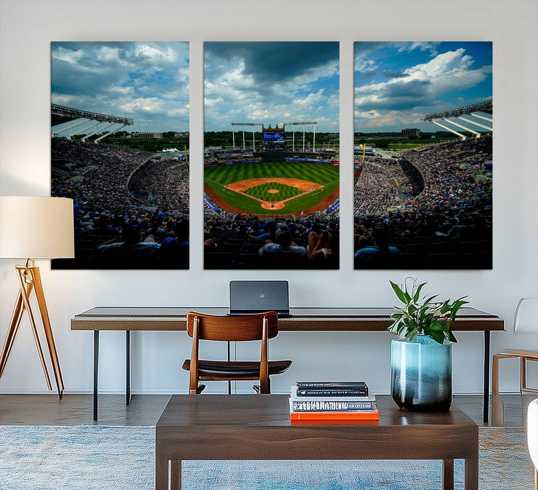 A 3-panel print of Kauffman Stadium, showcasing a crowded baseball field under cloudy skies.