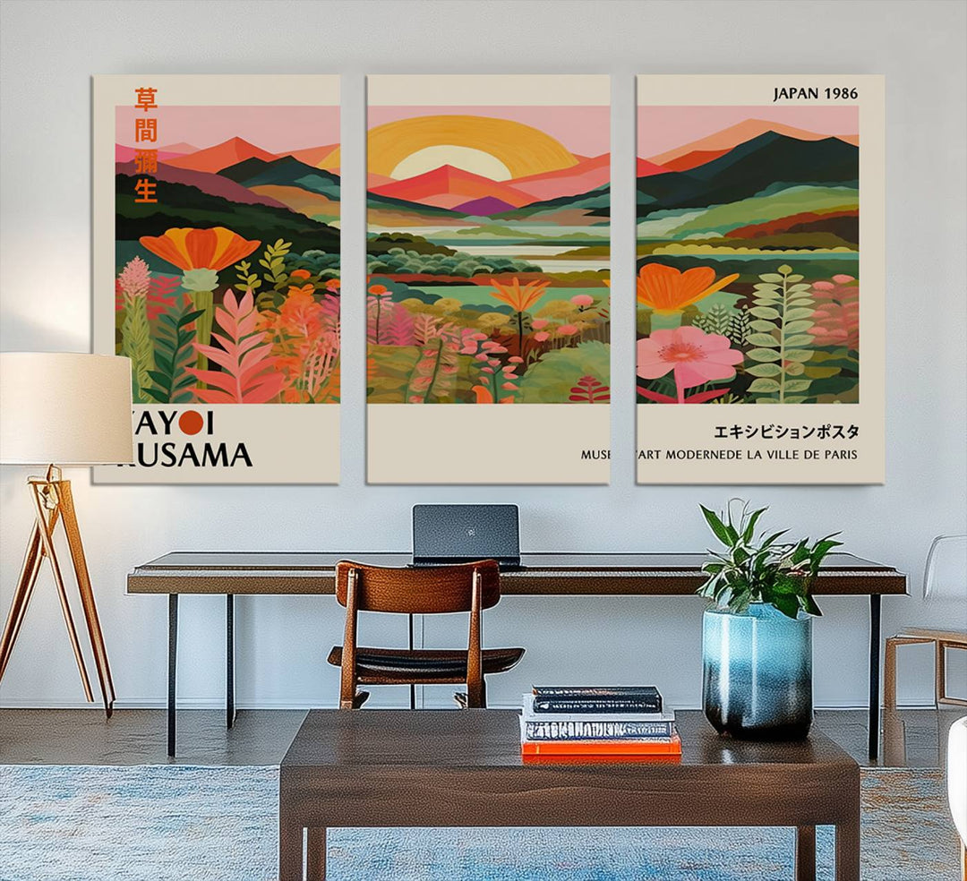 The Yayoi Kusama Landscape Canvas Print, featuring vibrant floral mountains and sunset scenery, enhances the room.