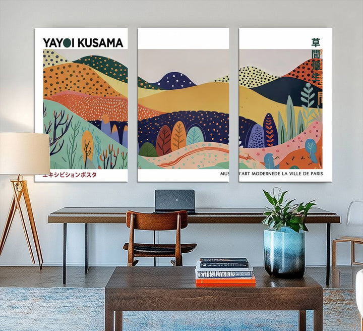 A Yayoi Kusama abstract landscape print adorns the wall.