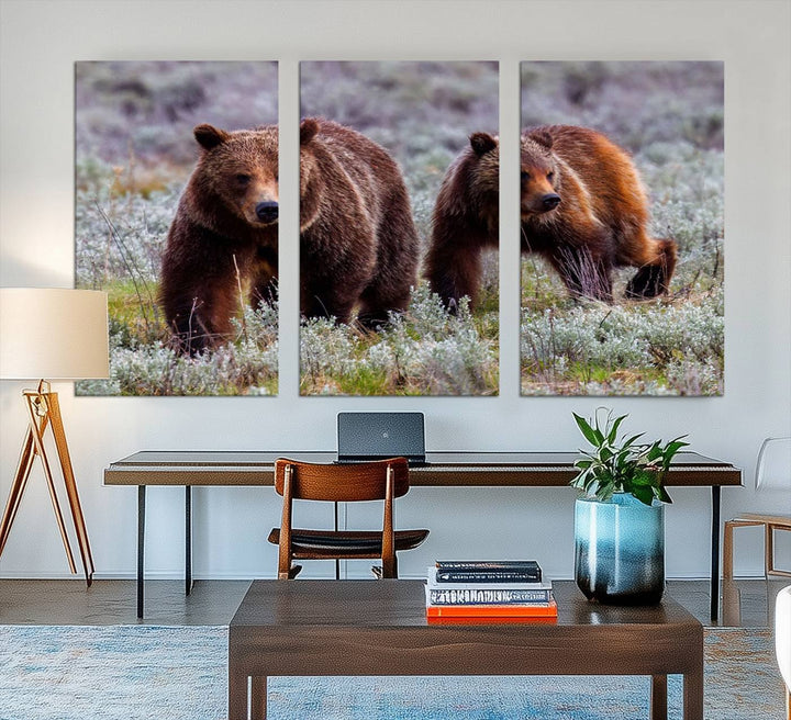 The "Queen of the Tetons" is a stunning canvas art print featuring Grizzly 399 and two bears strolling through a grassy field. Its gallery-quality finish beautifully captures the essence of nature, making it perfect for rustic home decor.