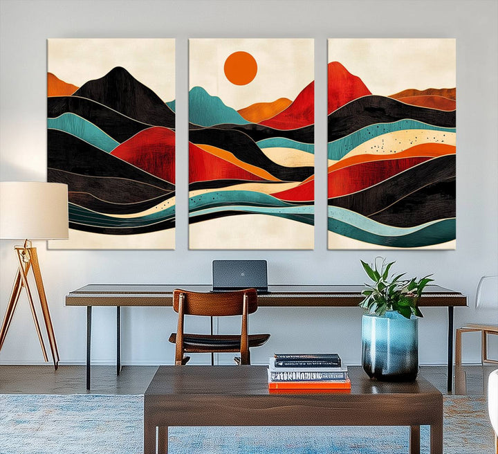 The Colorful Western Triptych Canvas features a vibrant mountain and sun design, making it perfect for modern kitchens or log cabin walls.