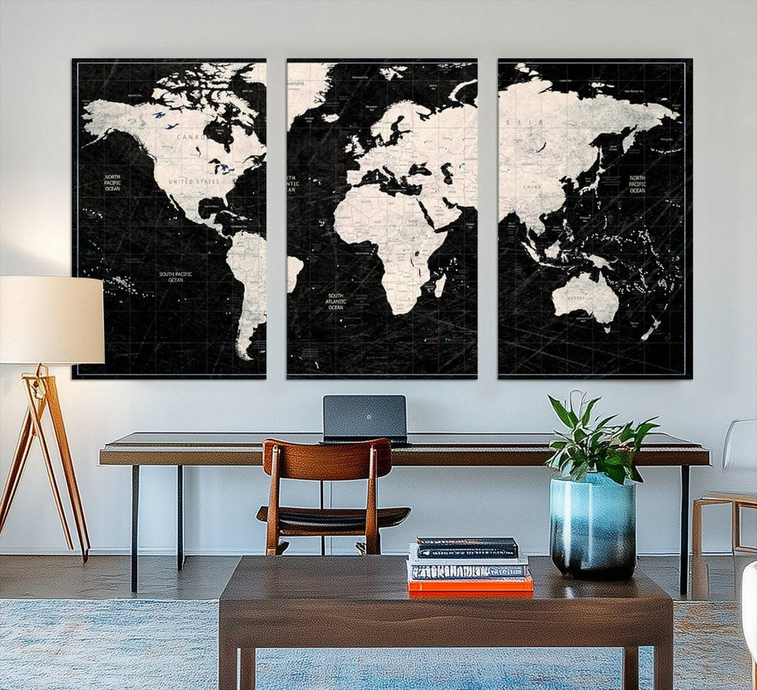 The Black & White World Map Canvas Wall Art, a giclee print, elegantly decorates the wall.