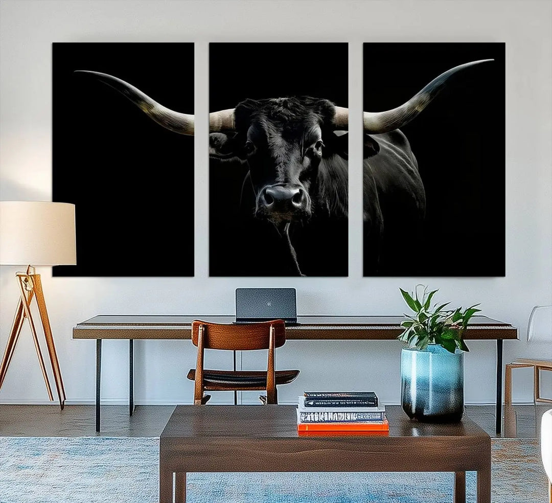 A captivating close-up canvas print of a Texas Black Longhorn with impressive curved horns set against a dark backdrop, ideal as a standout piece in your collection of Longhorn Cow Wall Art.