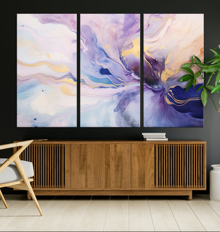 In the modern living room, a captivating Purple Color Abstract Wall Art Print graces the walls, mounted on museum-quality canvas, infusing the space with an artistic flair.