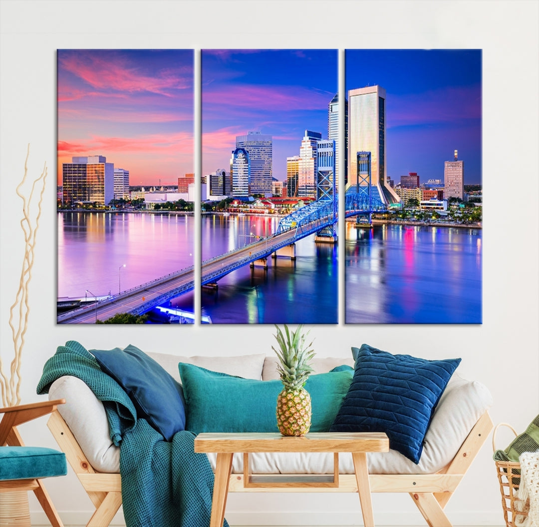 The Jacksonville Wall Art Canvas Print, showcasing the Jacksonville cityscape over a river at sunset, is elegantly crafted on museum-quality canvas with a UV-protective coating. Ready to hang, it elevates your space with its sophisticated charm.