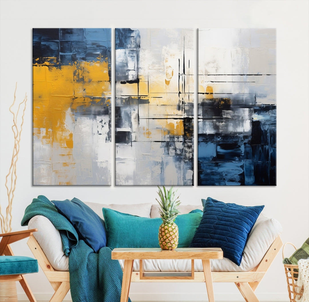 The Yellow Orange Blue Abstract Wall Art Print on gallery-wrapped, museum-quality canvases adds a vibrant touch to the room.