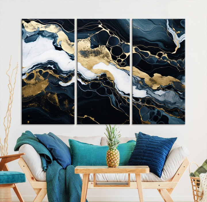 Fluid Marble Abstract Wall Art Print, a contemporary piece with black, white, and gold swirls on museum-quality canvas.