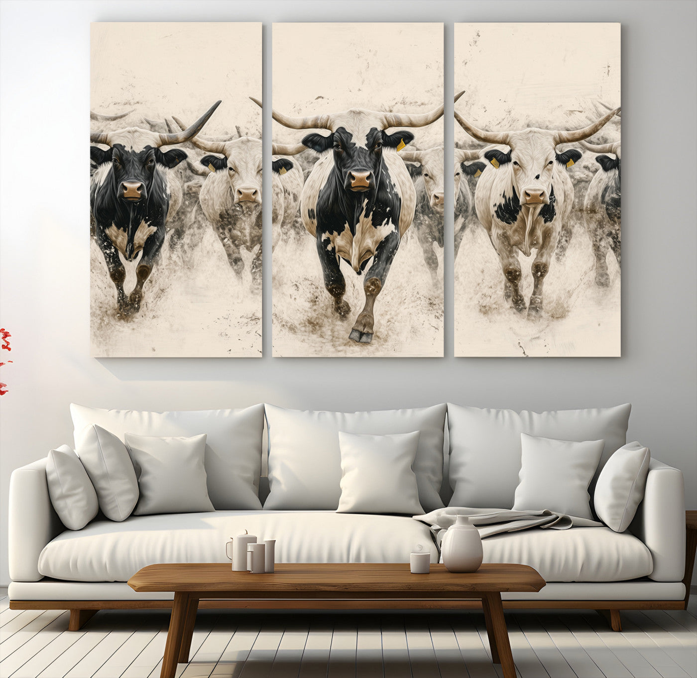 Canvas artwork of Texas Longhorn bulls walking in a dusty herd, ideal for rustic Western or country-style interior decor.
