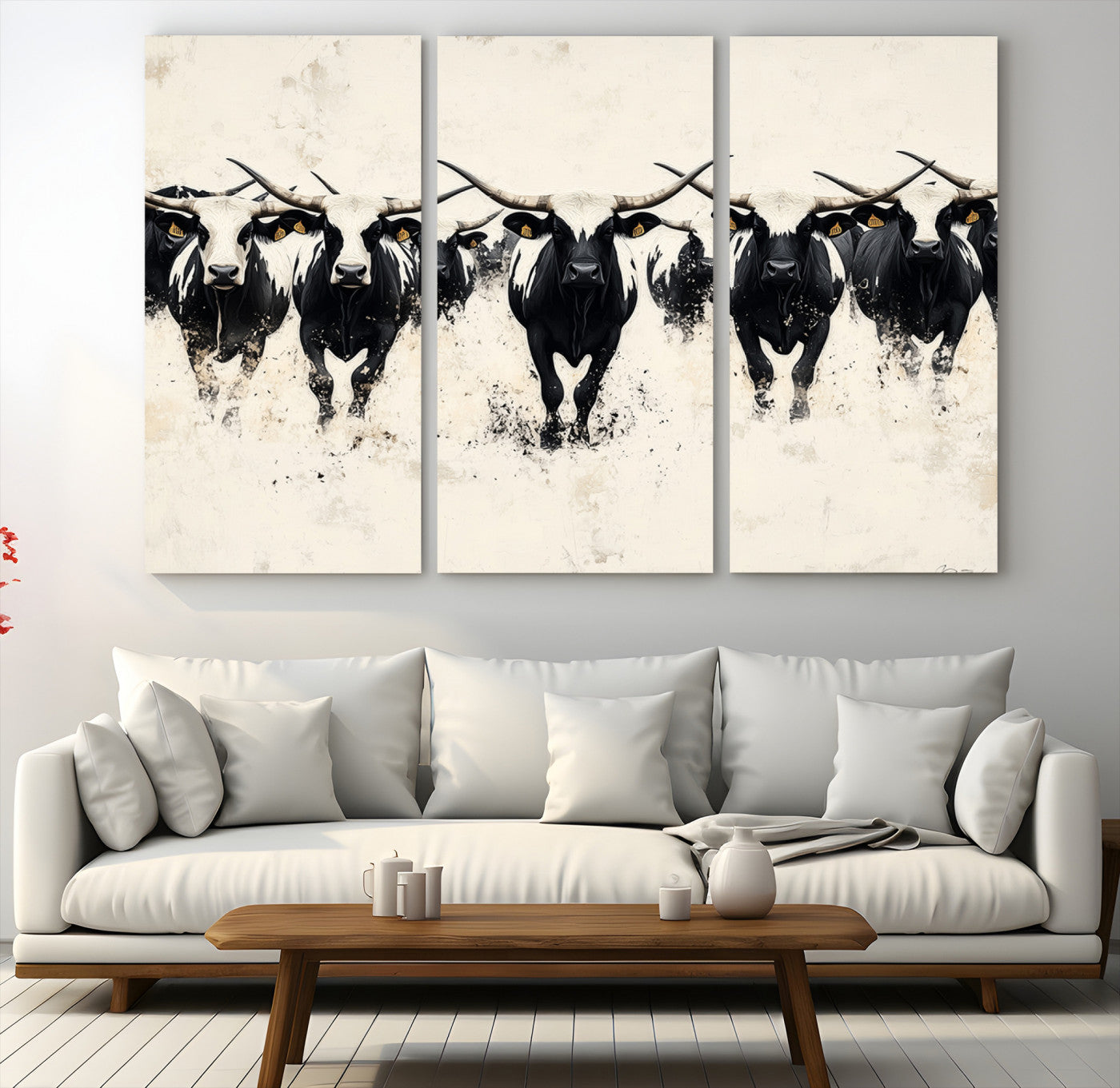 Canvas artwork of black and white Texas longhorns in a bold stampede over a minimalist background, ideal for rustic modern or Western-themed decor.