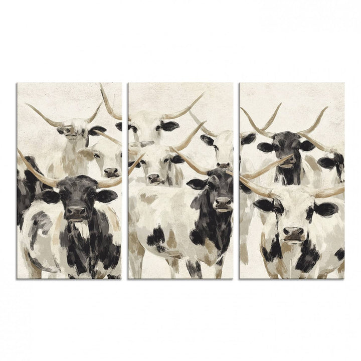 Canvas print titled Longhorn Texas Cow Drawing, depicting longhorn cattle with black and white markings, made in the USA, displayed on the wall.