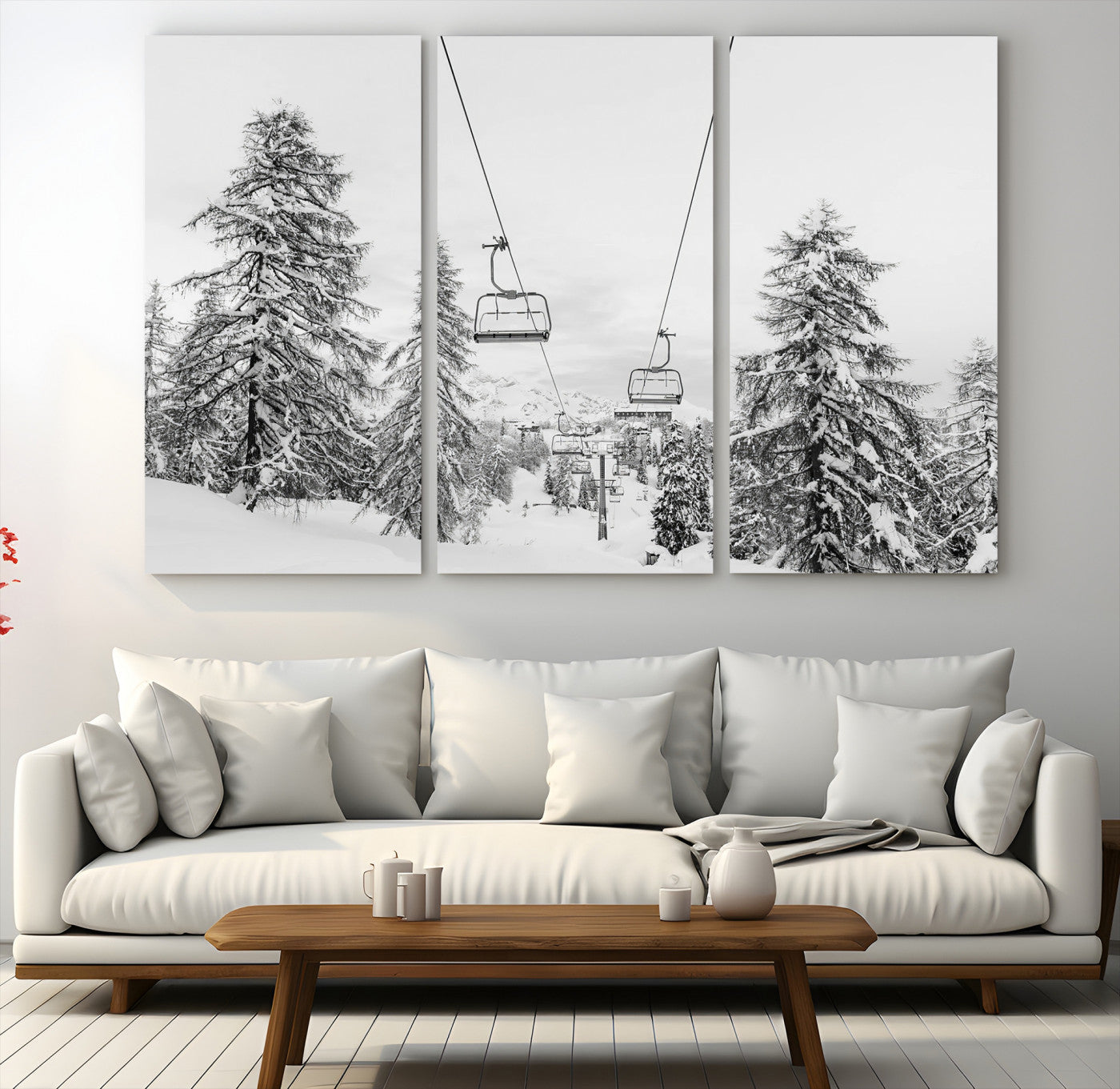 Black and white image of a ski lift amidst snow-covered pine trees, ideal for winter mountain or cabin-themed decor.