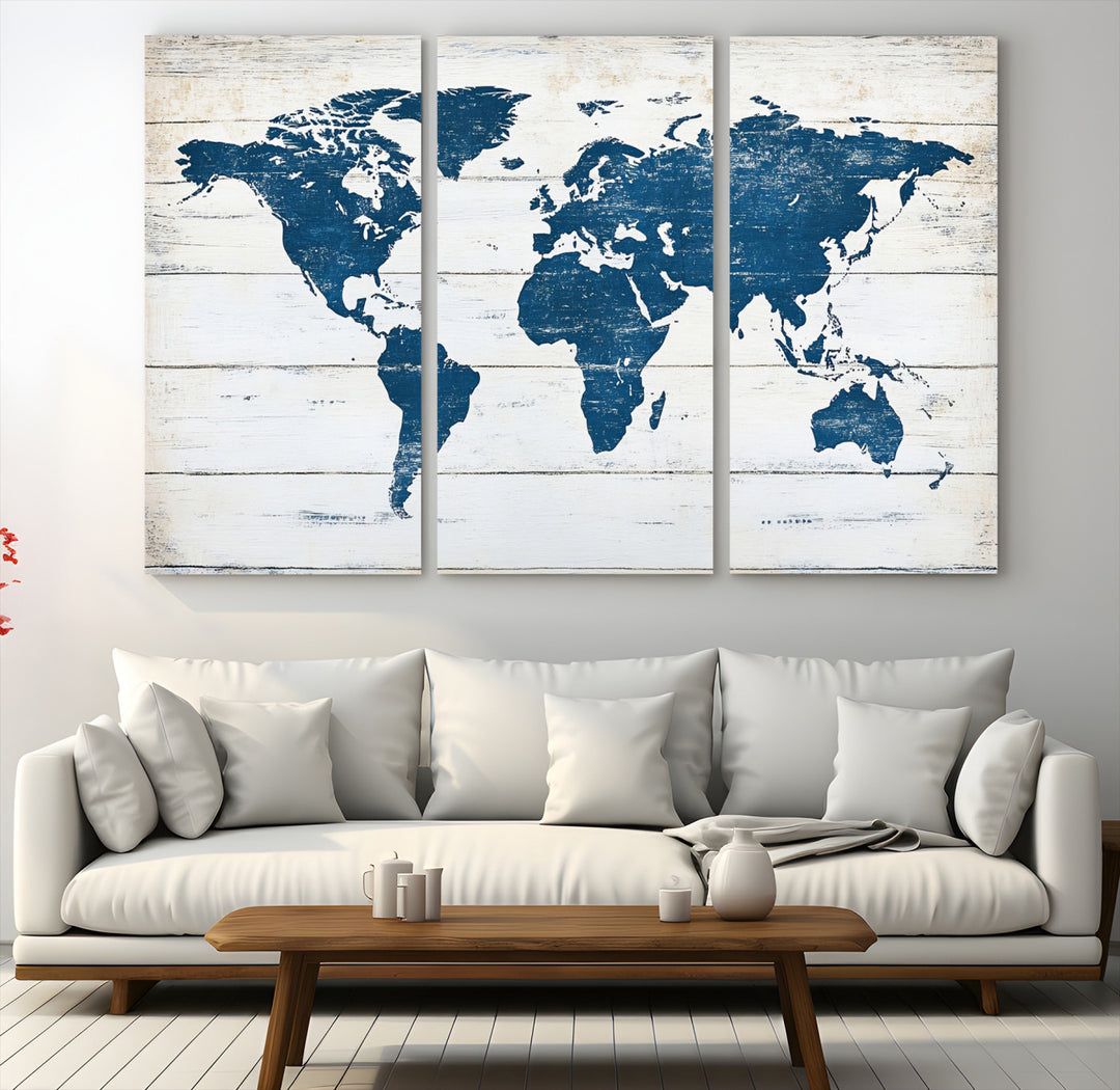 Rustic world map with blue continents on distressed wooden planks, perfect for coastal, explorer, or vintage-style wall decor.