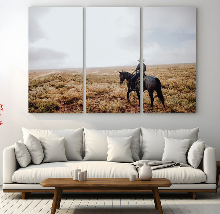 A lone cowboy riding horseback across an open prairie under a vast sky, capturing the rugged and timeless spirit of the Western frontier.