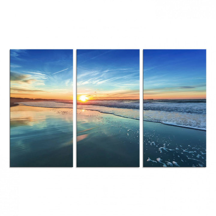 The Blue Sky and Beach Wall Art Canvas Print features a vibrant orange sky reflecting on wet sand.