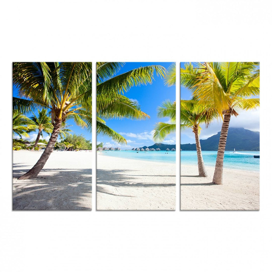 Blue Beach and Sea Wall Art Canvas Print: showcases a tropical scene with palm trees, white sand, and turquoise water.