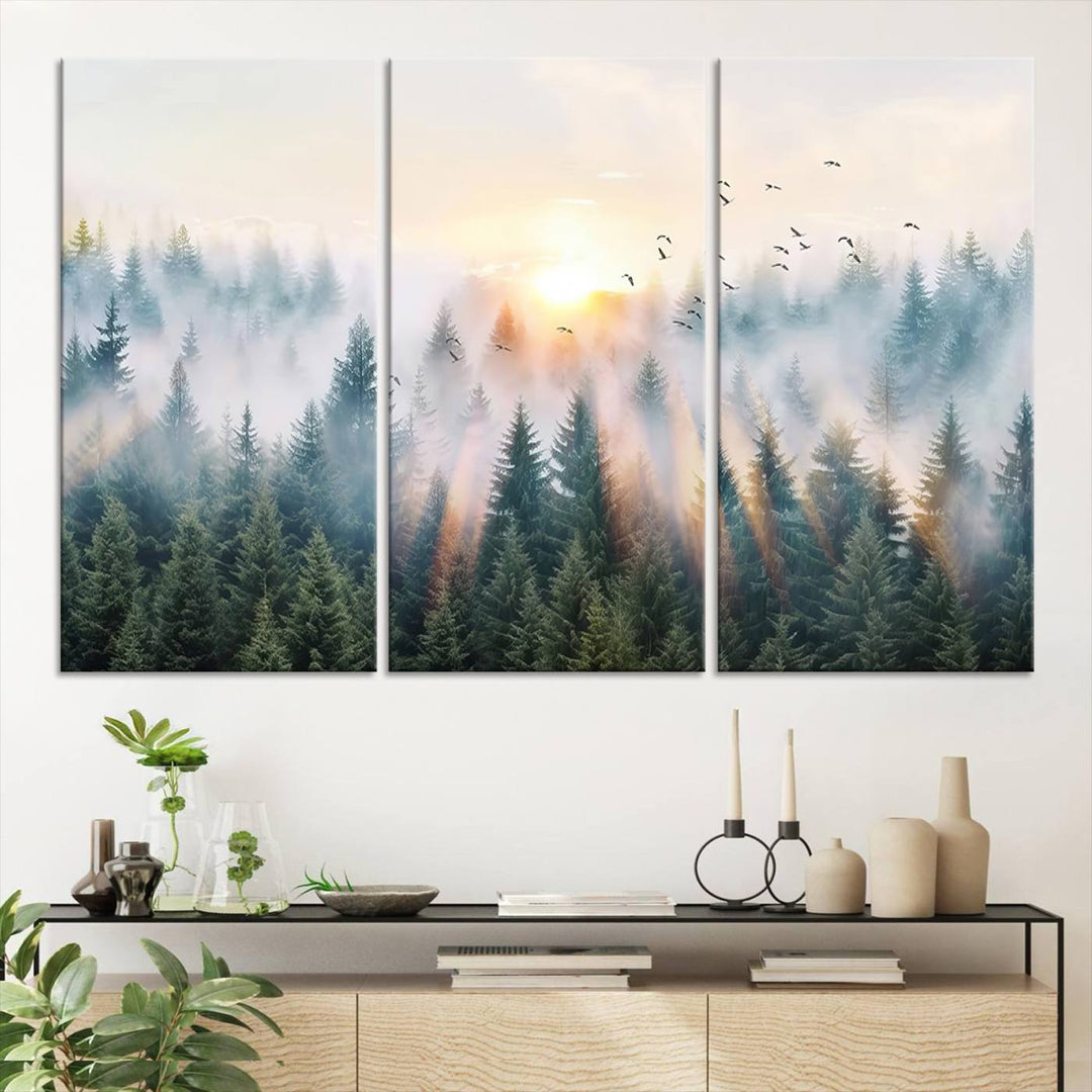 Misty Pine Forest Wall Art: A depiction of sunrise over foggy trees and birds against a bright sky; a framed woodland scene ideal for home or office decor.