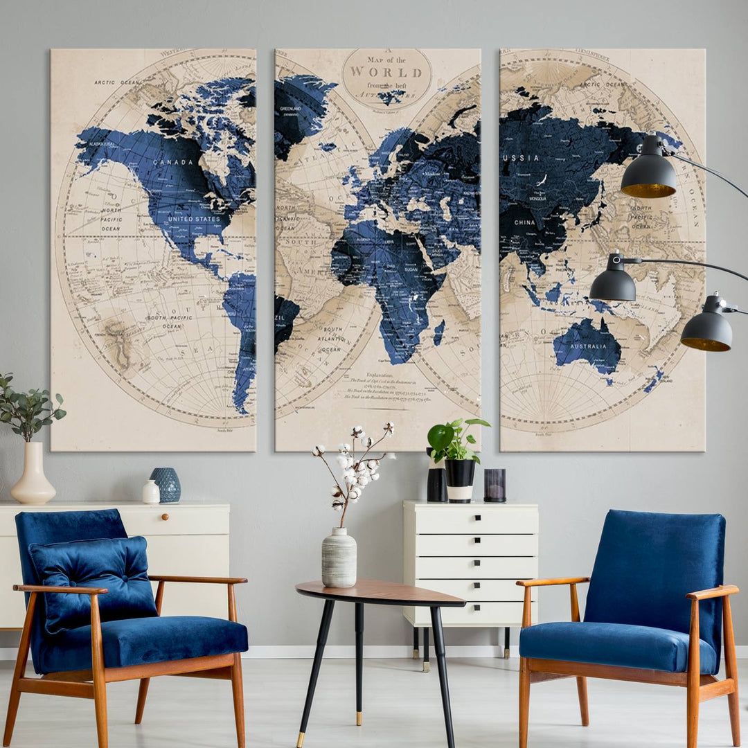 The Vintage Triptych Map Print is a grunge-stained blue and beige world map, perfect for enhancing wall decor.