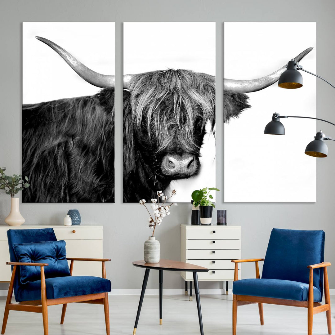 The Black and White Highland Cow Multi Panel Wall Art Canvas Print with UV-protection hangs prominently.