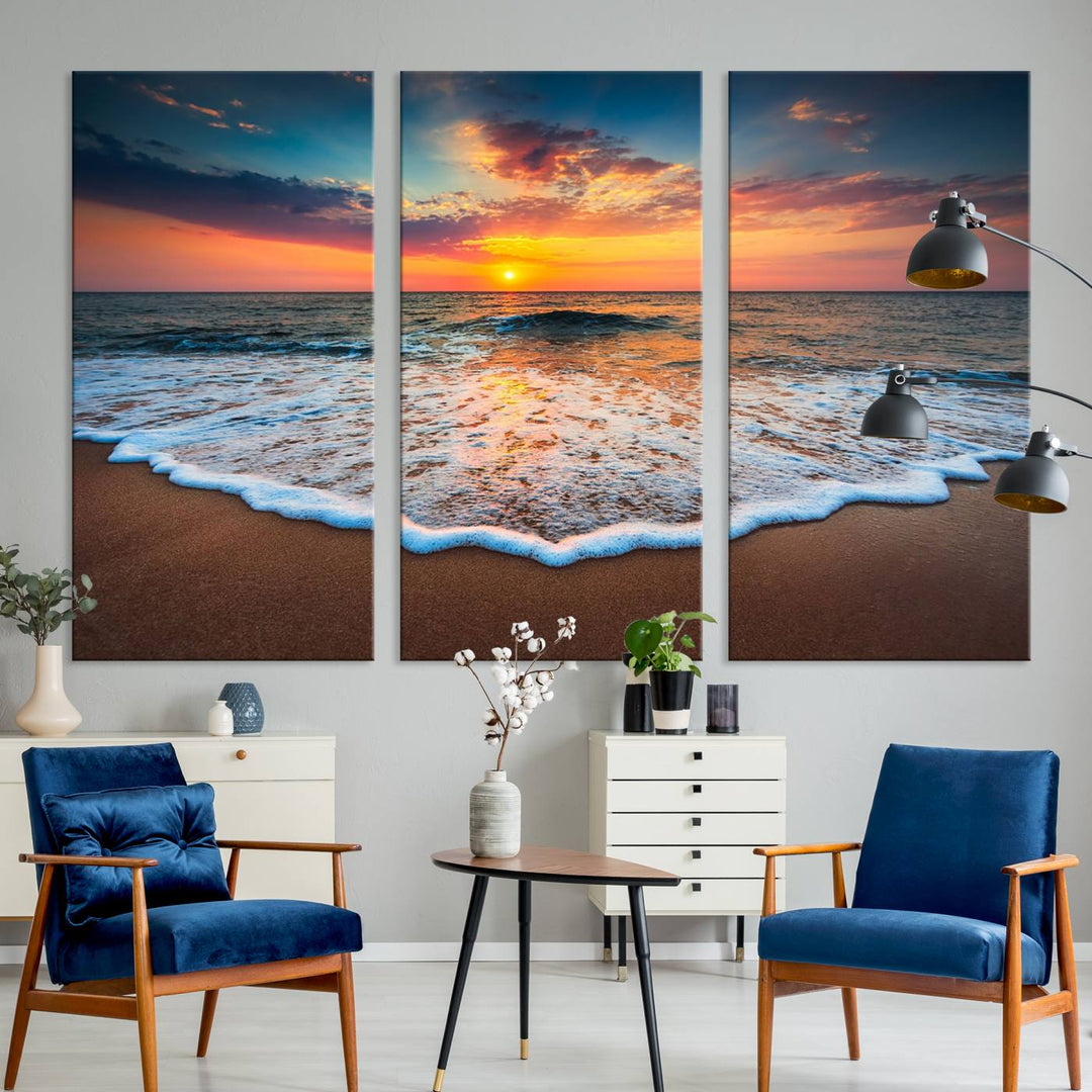 A Sunset with Calm Waves on the Beach Wall Art Canvas Print adorns the dining room.