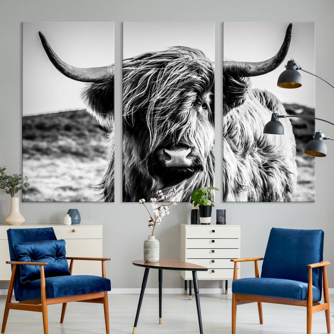 A Black and White Scottish Cow Canvas Print adorns the kitchen wall, perfect for farmhouse decor.