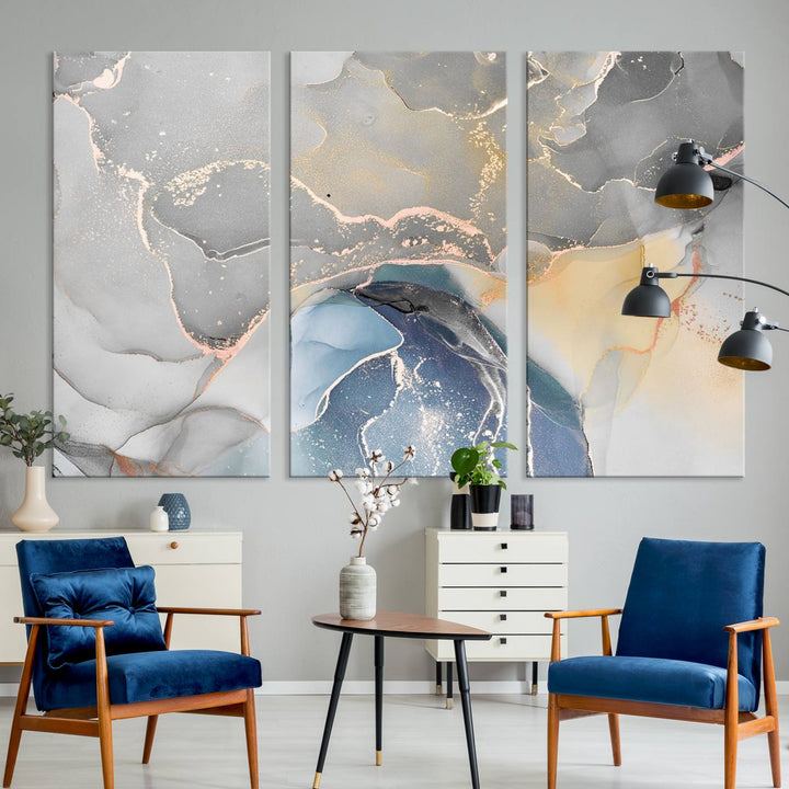 Gray Marble Fluid Effect Abstract Canvas with swirls of gray, gold, and blue.