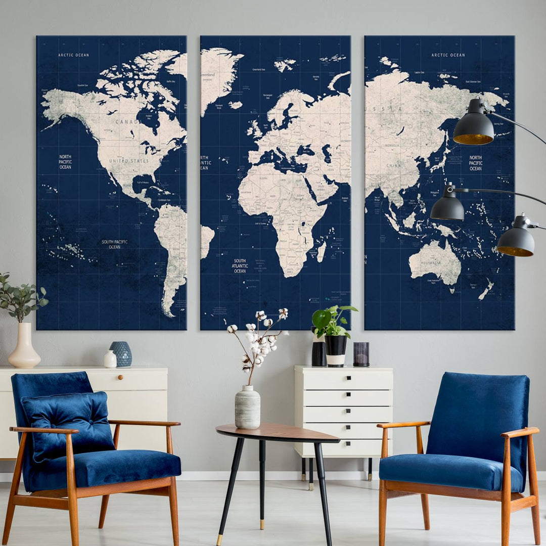 Large modern world map wall art canvas print in beige and navy; showcases a 3-panel vintage map design and is ready to hang.