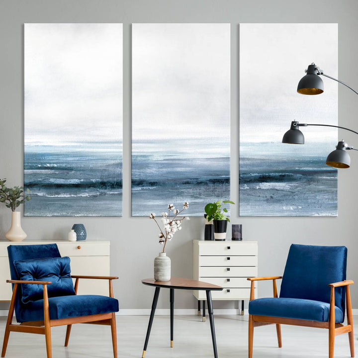 The dining area features Blue Ocean Abstract Artwork on canvas.