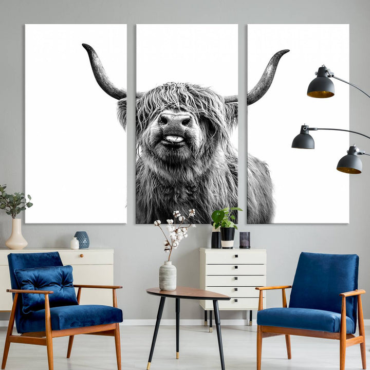 The Fanny Highland Cow art print decorates the modern kitchen, featured in black and white.