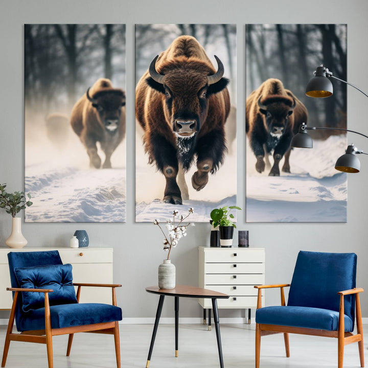 Wall art titled Cow Bighorn shows three bison running through snow in a forest.