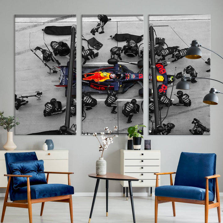 Red Bull Formula 1 Canvas Wall Art Print: An aerial view of a Formula 1 pit stop featuring a Red Bull car on premium canvas.