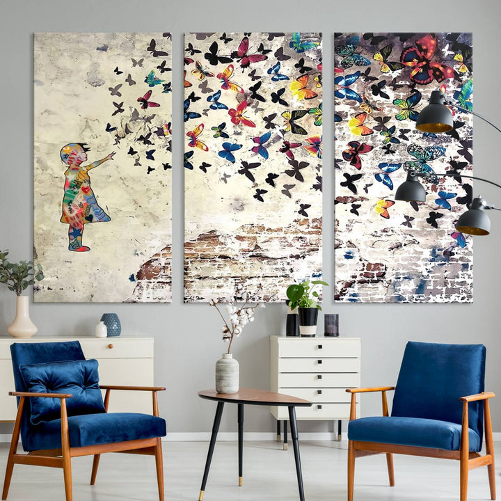 A Banksy Girl Butterfly Canvas Print is displayed on the textured wall.