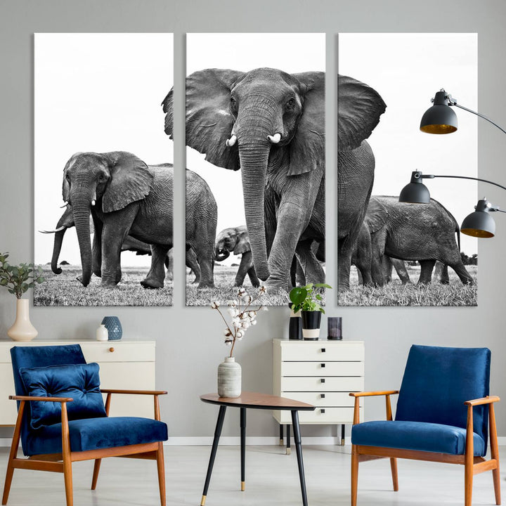 A modern dining area features a Black White Elephant Family Wall Art Canvas Print.