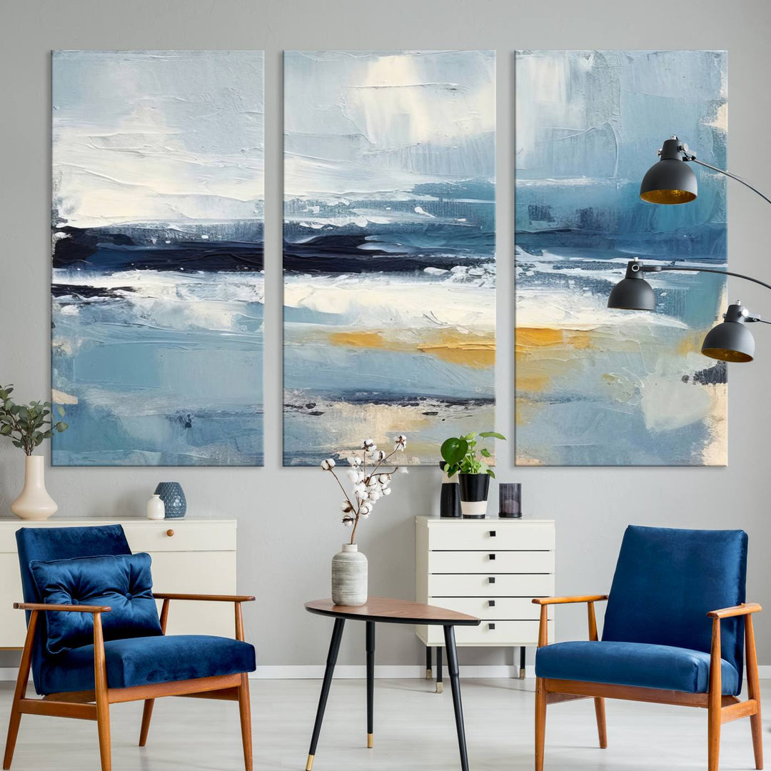 The Abstract Ocean Canvas Wall Art in coastal blue and gold enhances the modern kitchen.