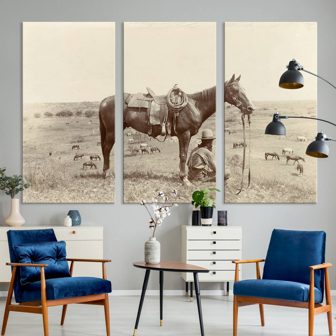 Cowboy Wall Art - Vintage Western Horse Canvas Print features a cowboy kneeling by his horse in a field.