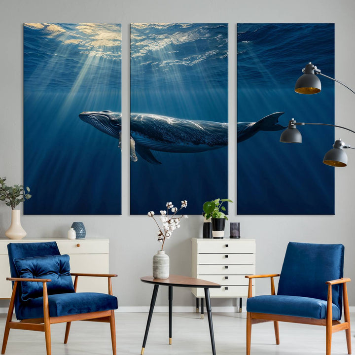 The Whale under Ocean wall art canvas print graces the white wall.