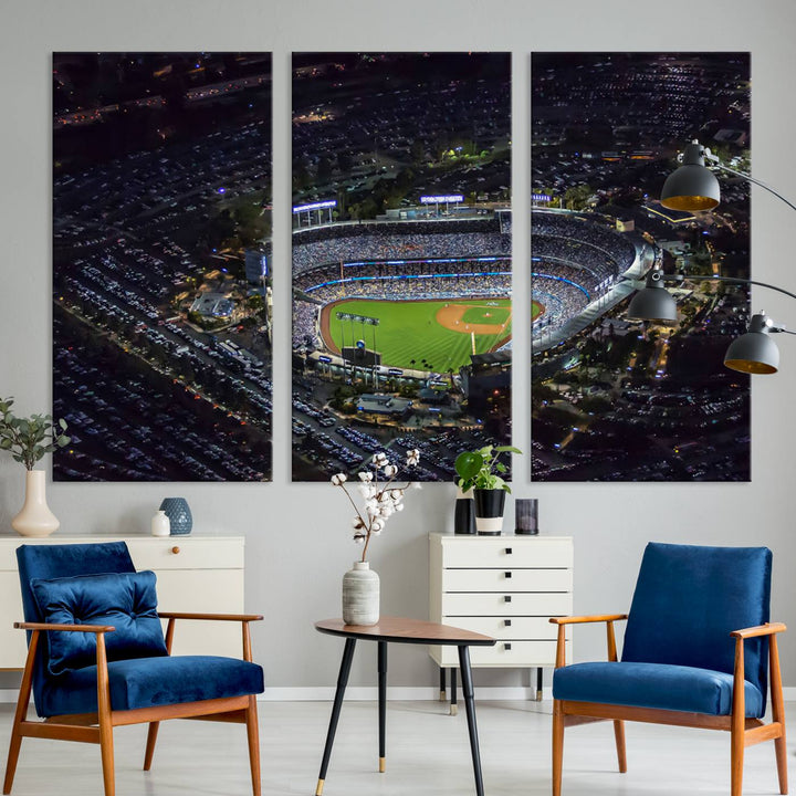 A large Los Angeles Dodgers print of Dodger Stadium at night is displayed near a window.