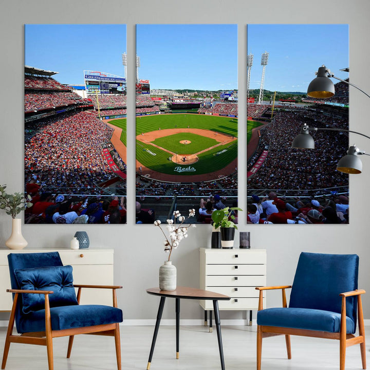 The Cincinnati Reds Baseball Team print of Great American Ball Park Stadium adorns the wall.