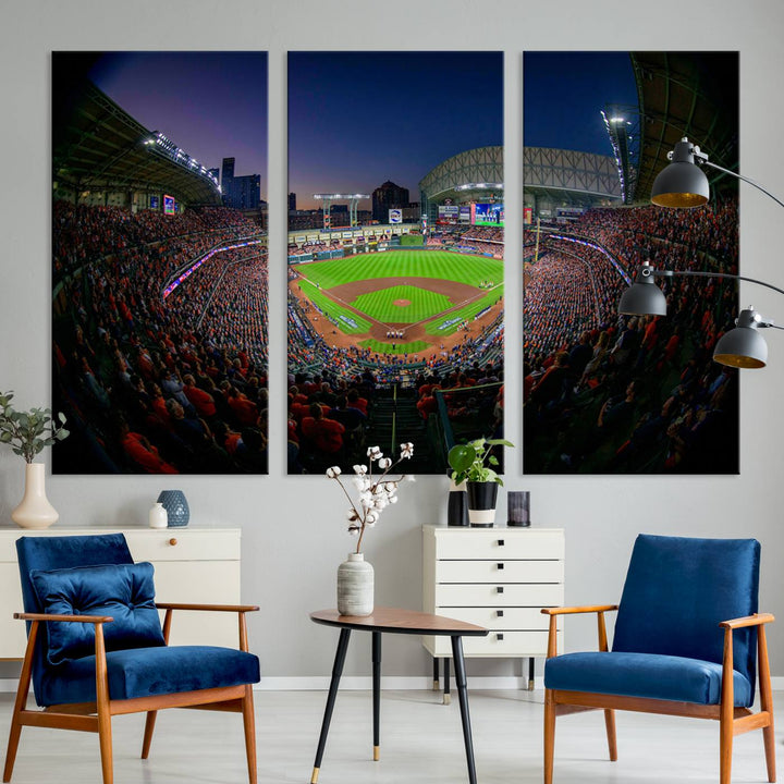 A canvas print of Houston Minute Maid Park at dusk is mounted on the wall.