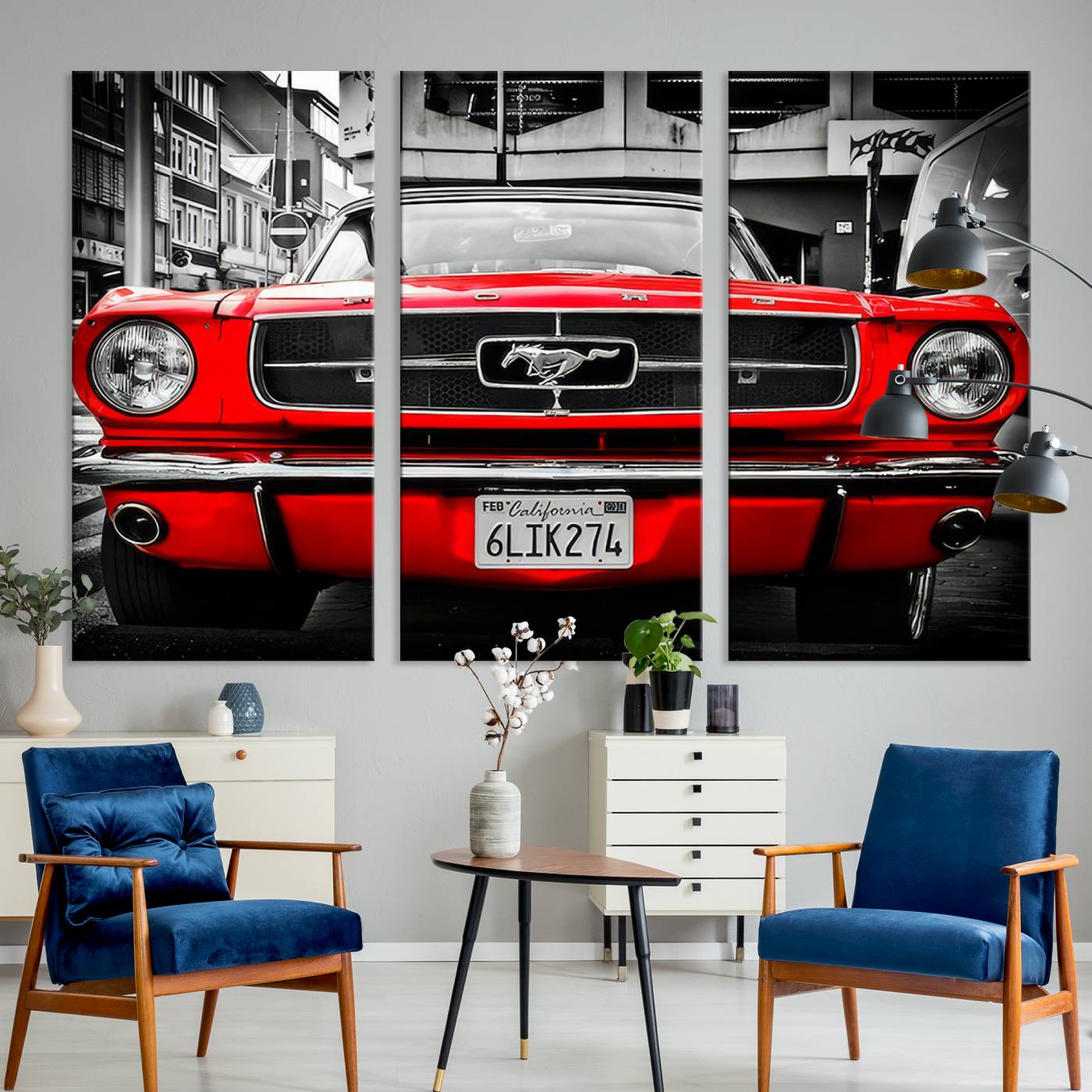 Front view of a bold red 1960s Ford Mustang parked in an urban environment, captured in dramatic contrast with a black-and-white city backdrop, emphasizing its timeless American muscle car identity.